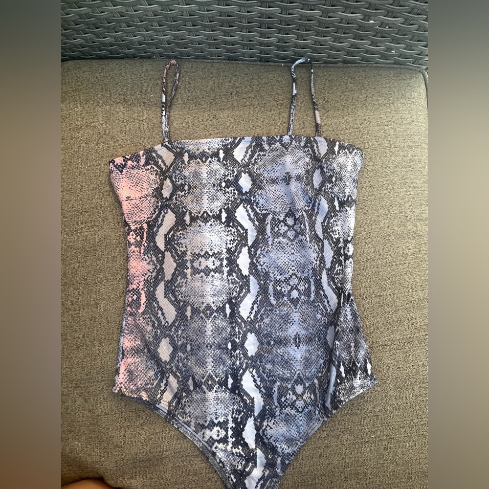 shiny snakeskin body suit